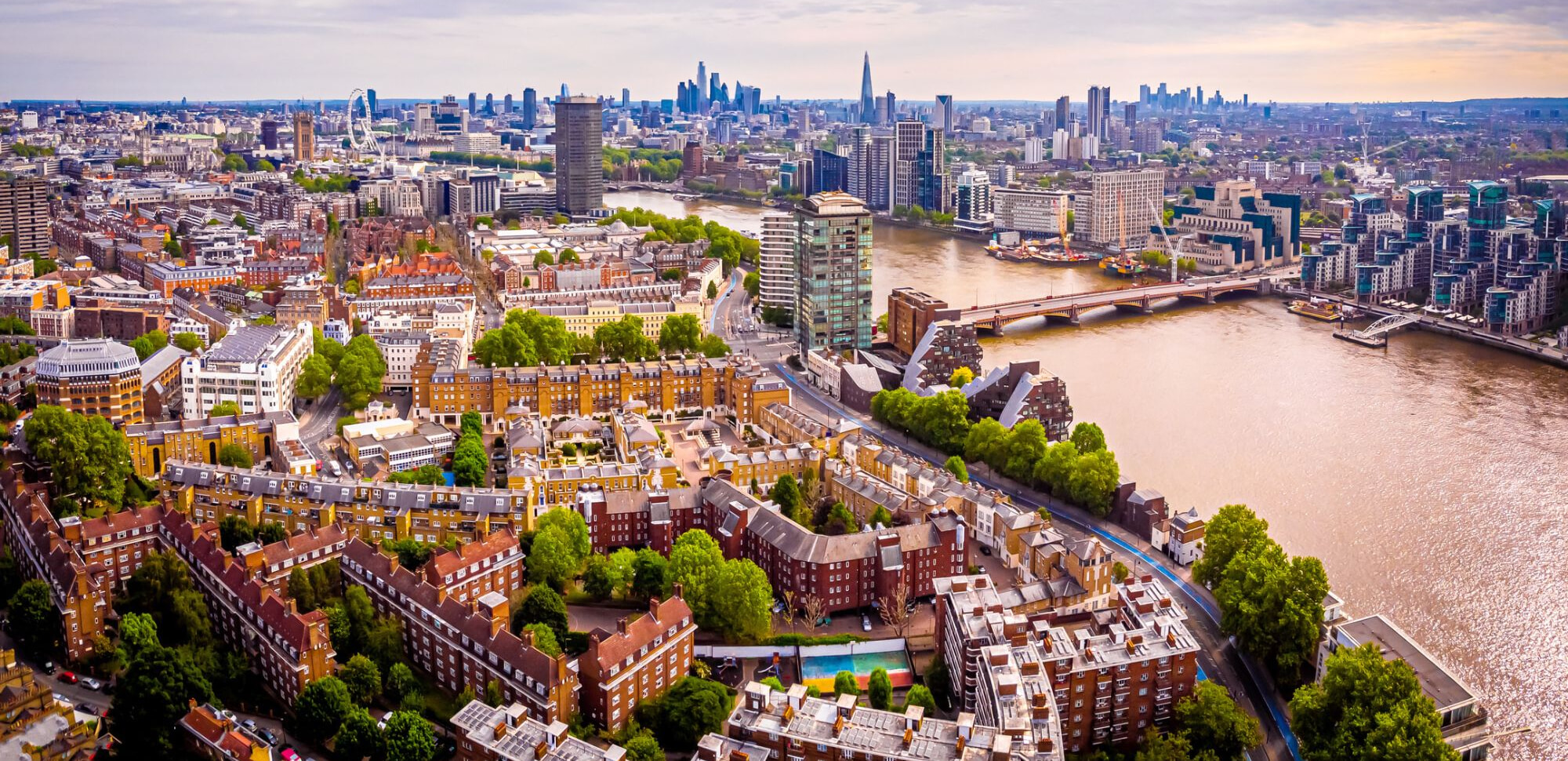 Aerial view of Pimlico and the river Thames, with central London in the distance